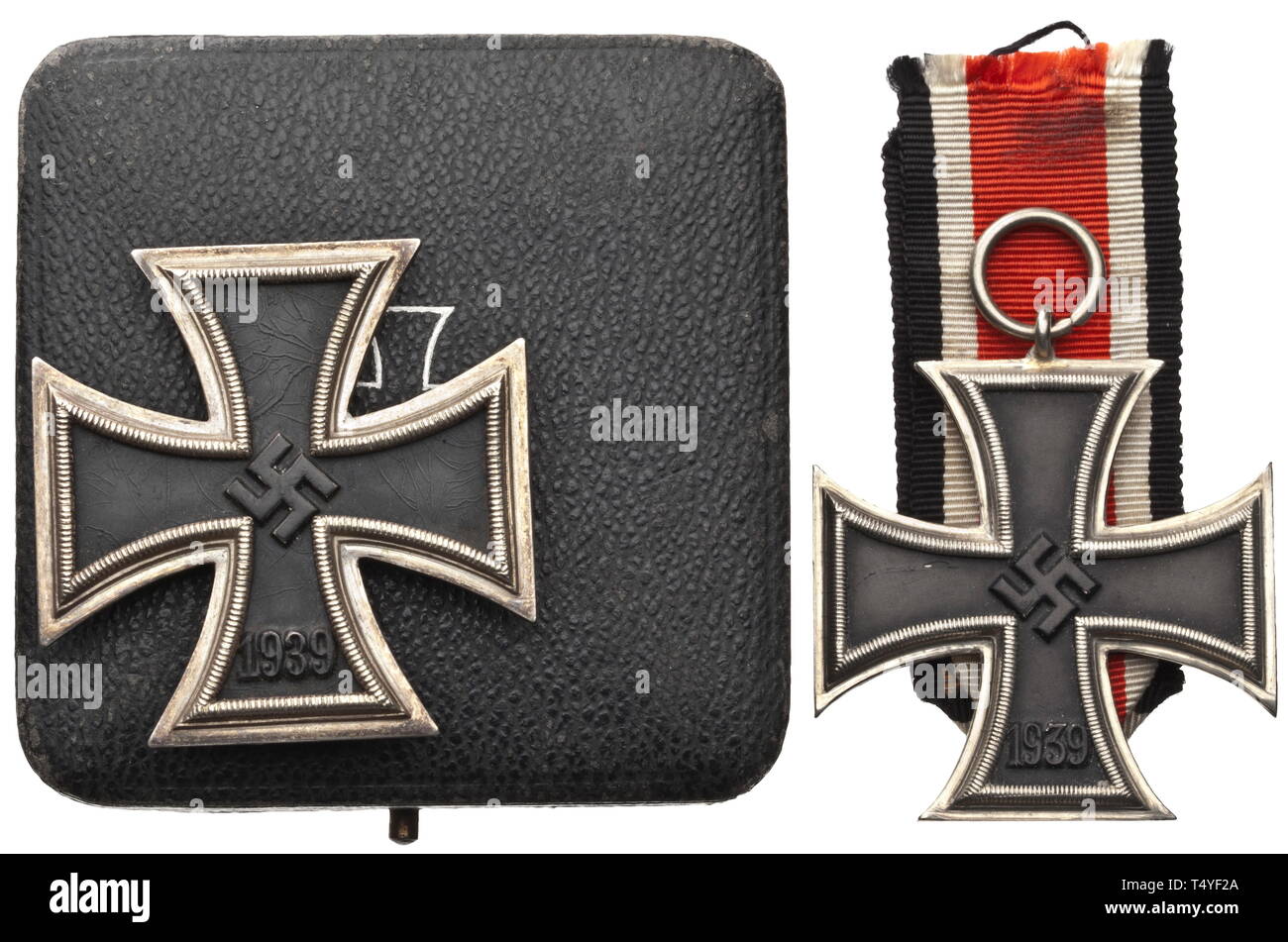 An Iron Cross 1st and 2nd Class of 1939 - rare variants. The Iron Cross 1st Class issued with 'Round 3' in the year numeral, multiple sections, magnetic iron core. Dimensions 44.2 x 44.6 mm. With the award presentation case, lined inside with white velvet and silk. Included is a 'Schinkel' issue Iron Cross 2nd Class, issue as previous, open suspension ring, on a ribbon segment. Dimensions without suspension ring 42.7 x 48.5 mm. No maker's marks, beautiful patina on these rare Iron Cross variations. historic, historical, awards, award, German Reich, Third Reich, Nazi era, Na, Editorial-Use-Only Stock Photo