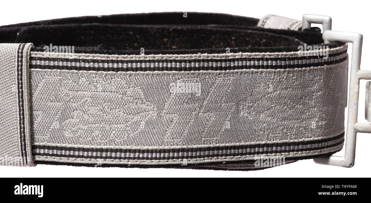 A parade belt for leaders. The aluminum belt buckle by maker Overhoff, reverse stampings 'RZM', 'SS', '36/39' and 'OLC'. The belt of aluminum weave with in-woven runes and oak leaves, the reverse backed in black velvet. Slightly worn, in good condition, the buckle with slight corrosion marks. The brocade belt for the black service uniform from circa 1939 is of substantially greater rarity than the brocade belt with green backing for the field-grey uniform. historic, historical, 20th century, 1930s, 1940s, Waffen-SS, armed division of the SS, armed service, armed services, N, Editorial-Use-Only Stock Photo