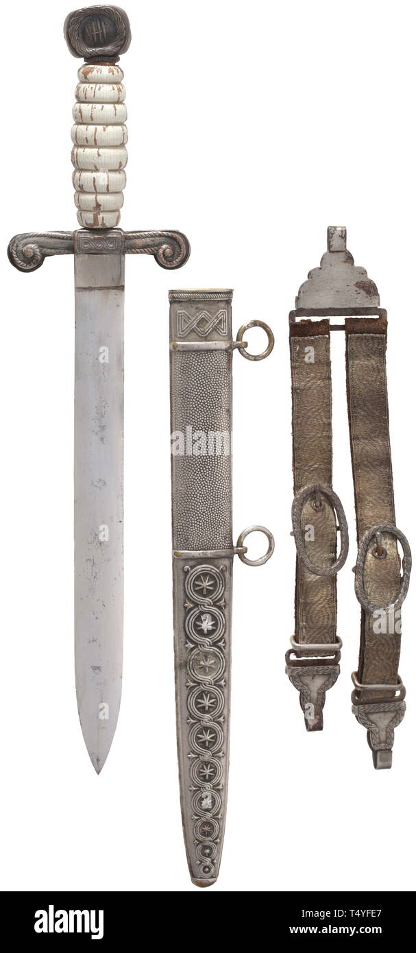 A Ustasha dagger with hanger. Symmetrical blade of lenticular cross section (lightly stained), reverse maker's mark 'Josip Bobek Zagreb'. The hilt of silvered non-ferrous metal, white painted wood grip, the pommel with initials 'NHD' (Nezavisna Drzava Hrvatska - the Autonomous State of Croatia). Scabbard of brass, the locket marked 'Braca Knaus Zagreb'. Including the leather hanger with applied laces on the front side. Signs of usage and age. Length ca. 40 cm. Rare. 22151 historic, historical, 20th century, Additional-Rights-Clearance-Info-Not-Available Stock Photo