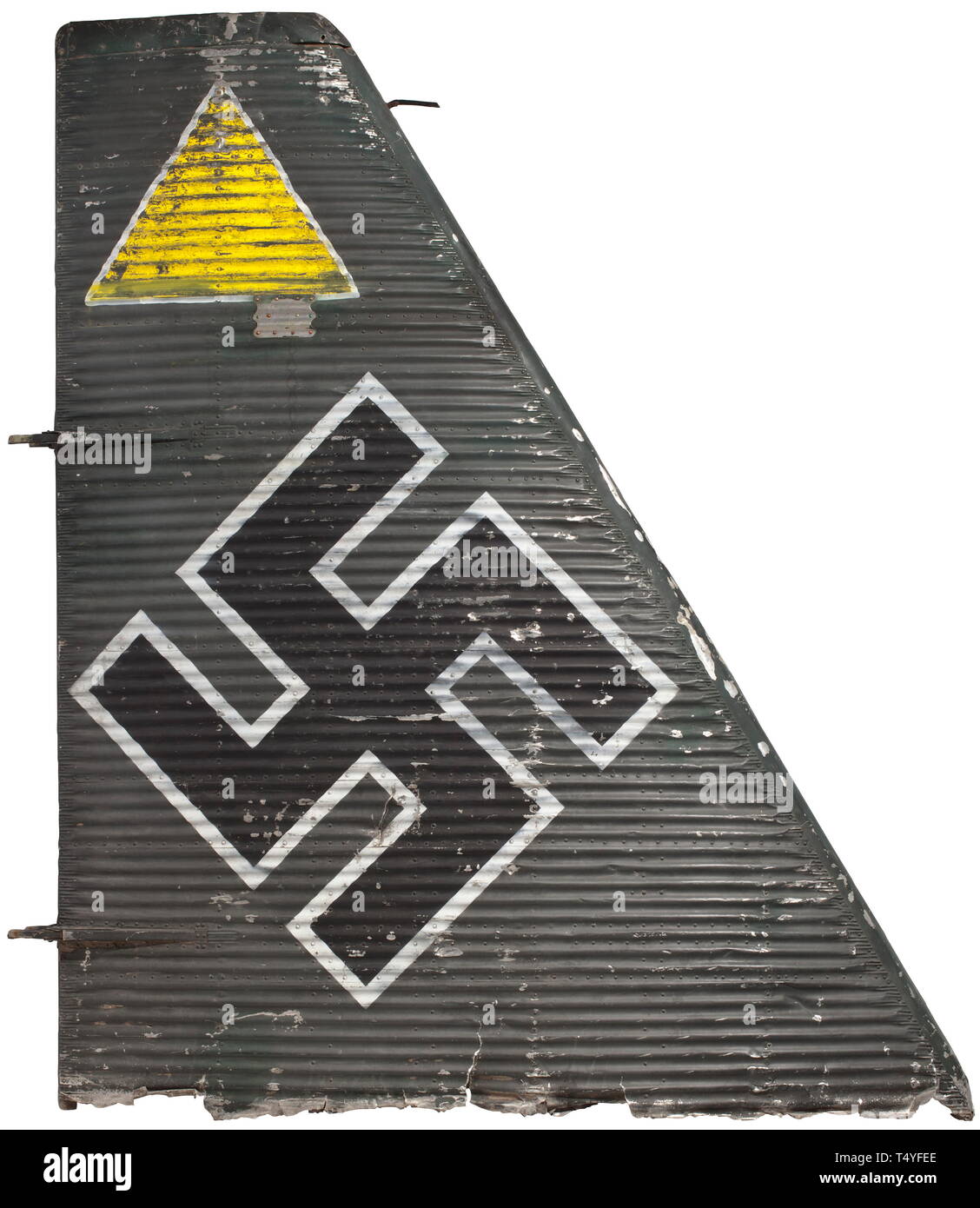 A Junkers JU-52 tail unit with tactical and national symbols. The tail unit of aluminium worked in multiple layers, multi-riveted, labelled and painted in typical Luftwaffe grey. A national emblem at the middle, above which is a tactical symbol for the third aircraft of the squadron. Riveted-on type plate with designation '010 - 1508 - mdq'. Marks of age and damage. Dimensions ca. 180 x 210 x 35 cm, weight ca. 20 kg. In 1944, this aircraft was forced to make an emergency landing in the vicinity of Salzburg, and its components were used by the civilian population after the d, Editorial-Use-Only Stock Photo