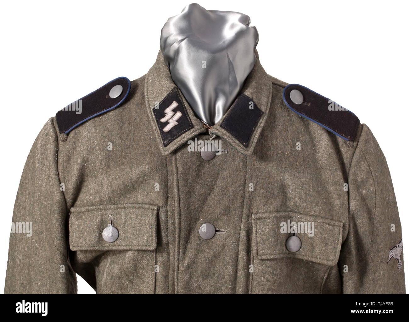 A field tunic M 43 "double-hole jacket" for enlisted men of medical troops,  made of green felt, grey buttons, stitched-in collar patches,  machine-stitched SS sleeve eagle in BeVo issue, looped shoulder boards