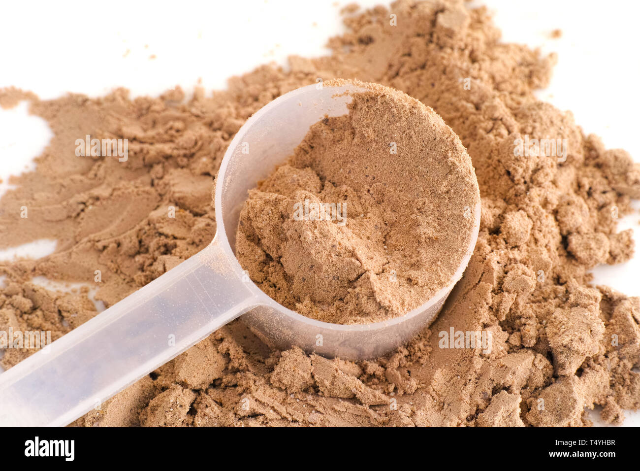 Soy Protein Isolate Powder in a scoop. Close up. Stock Photo