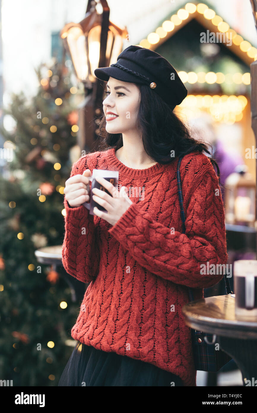 Woman in red sweater on hi-res stock photography and images - Alamy