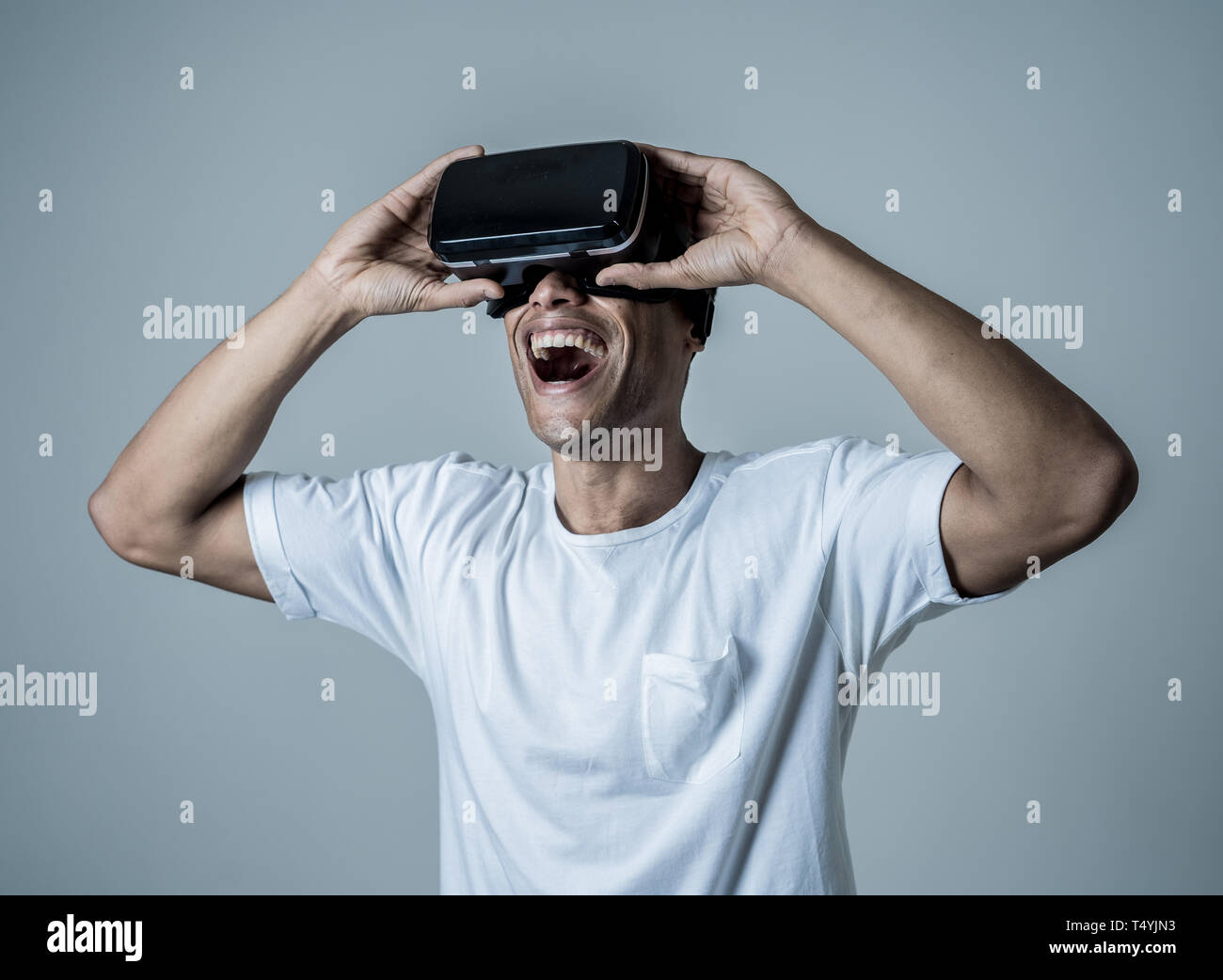 Amazed african american man using VR headset glasses, feeling excited ...