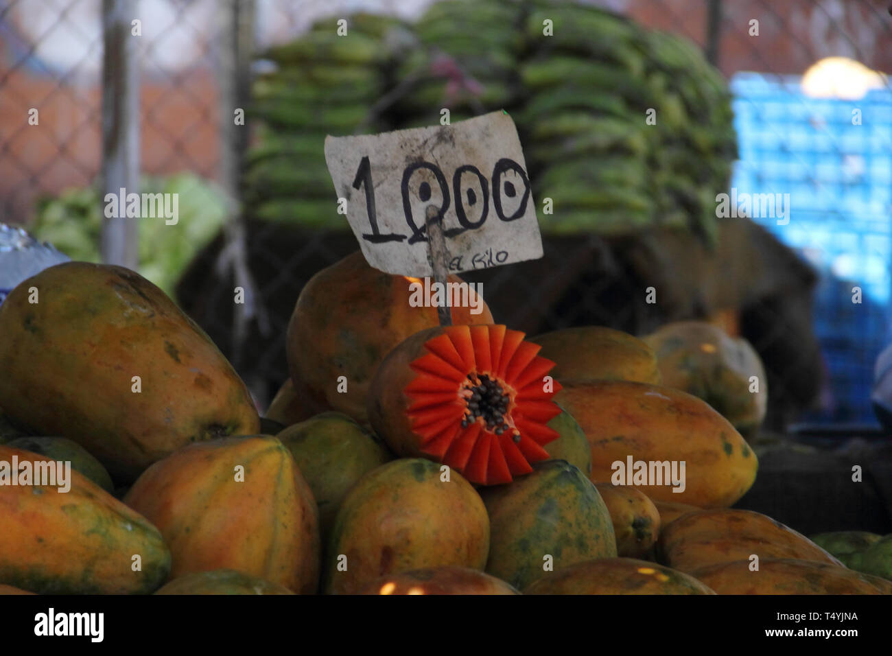 Papayas with price board in the market Stock Photo Alamy