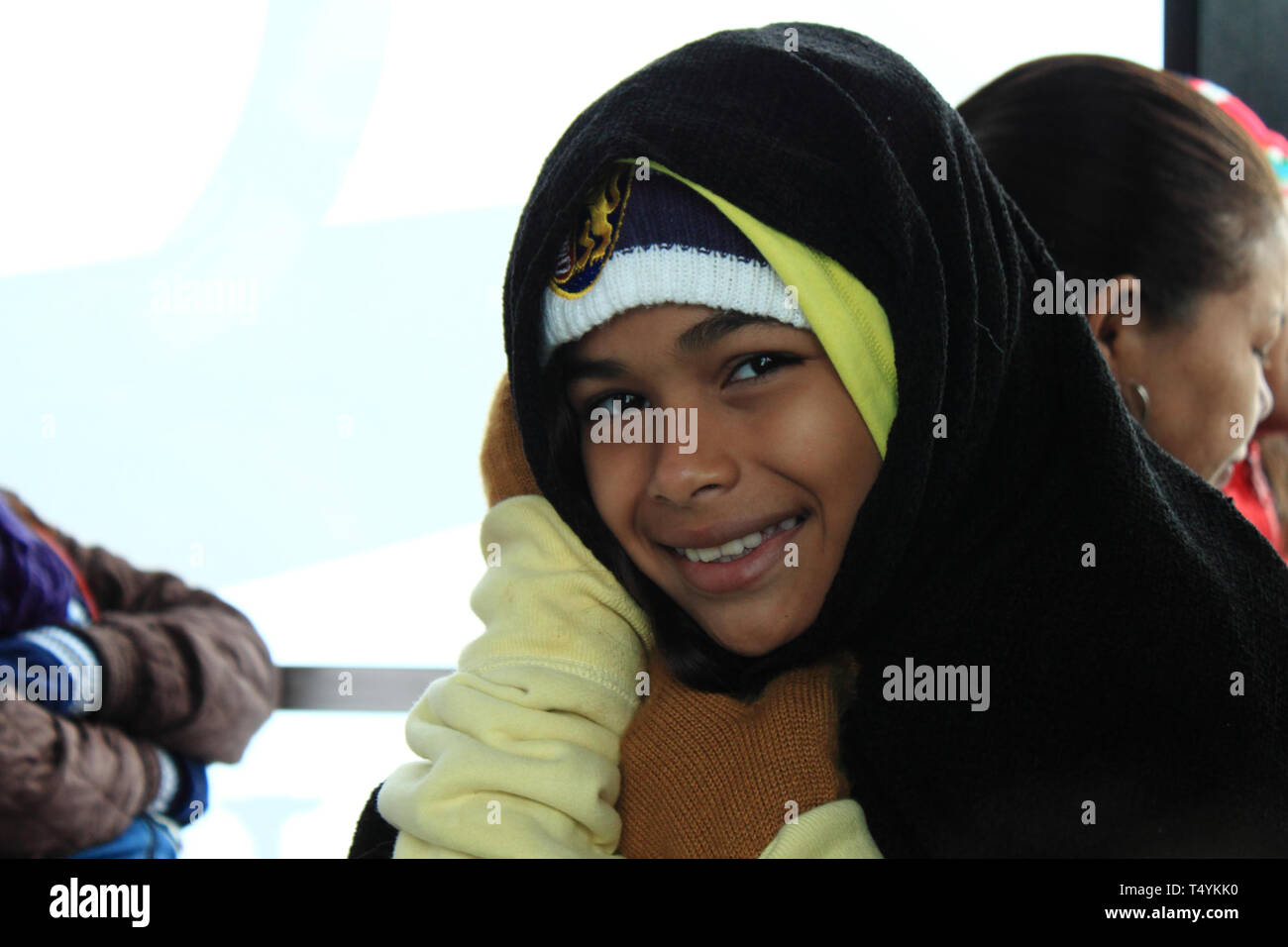 Merida, Venezuela - May 12, 2017: Portrait of a young girl in warm clothing at teleferico station. Stock Photo