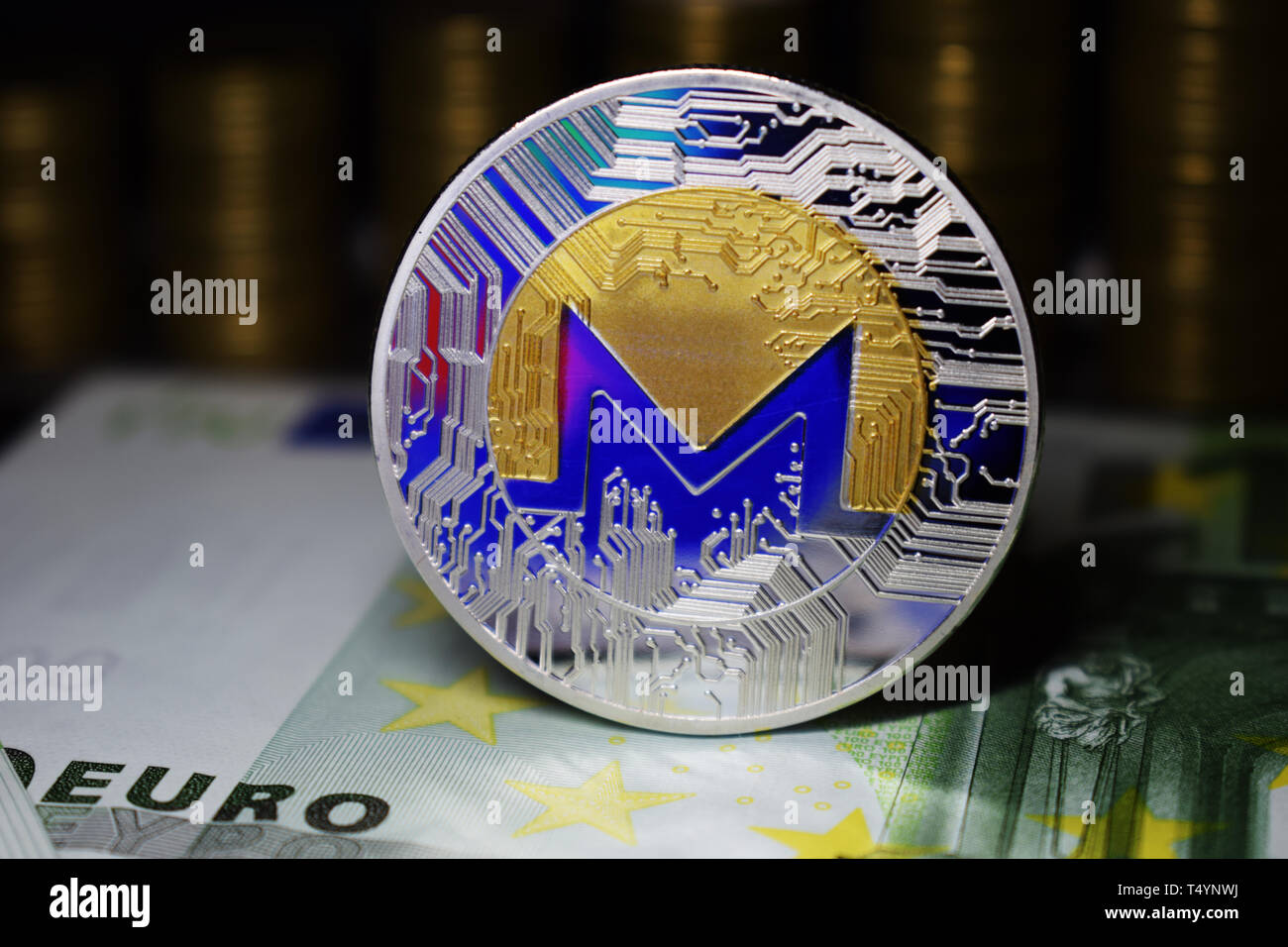 Coin physical Monero XMR with a blue tint. Concept of cryptocurrency Stock  Photo - Alamy