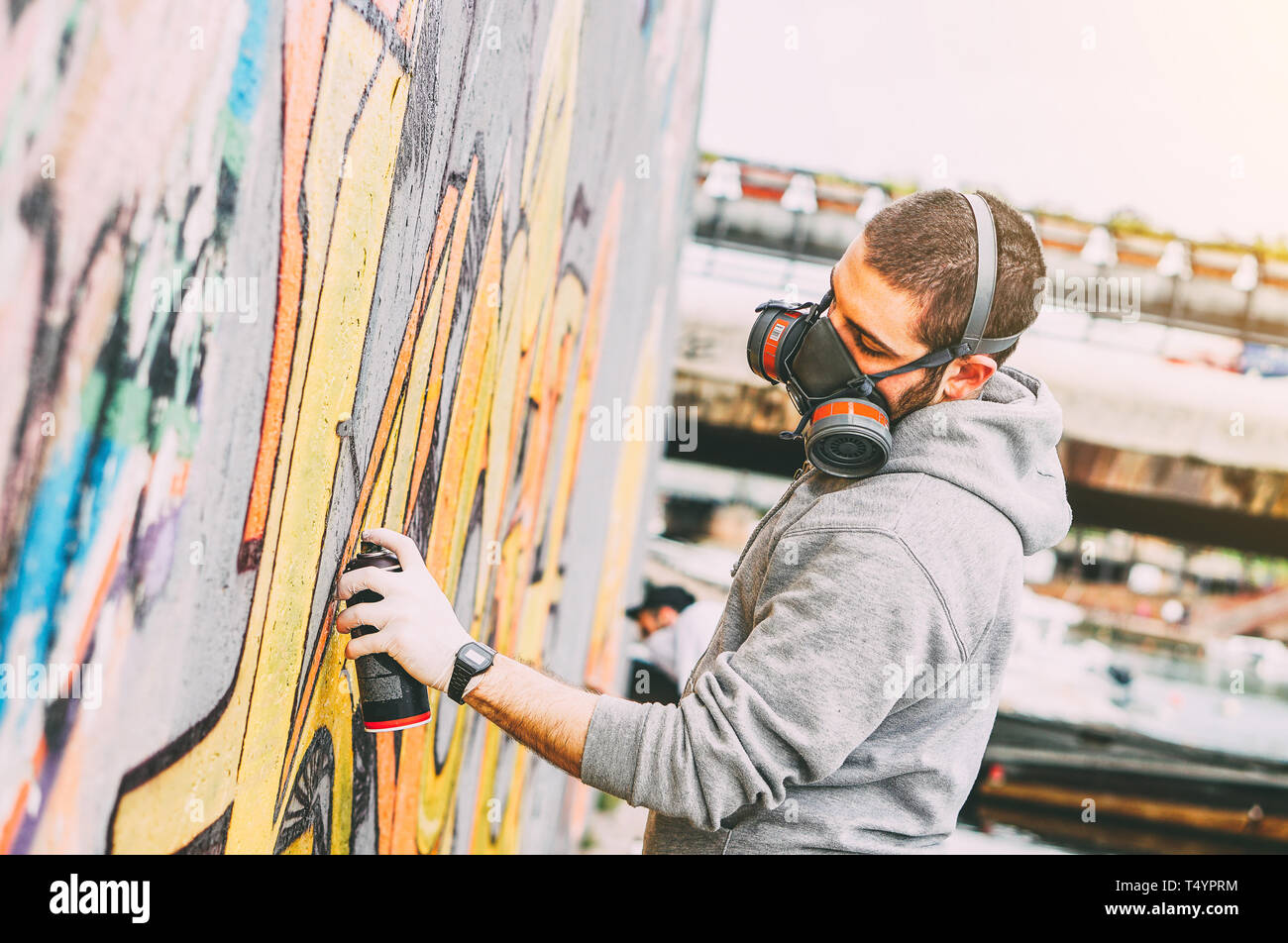 Grafitti artist painting hi-res stock photography and images - Alamy