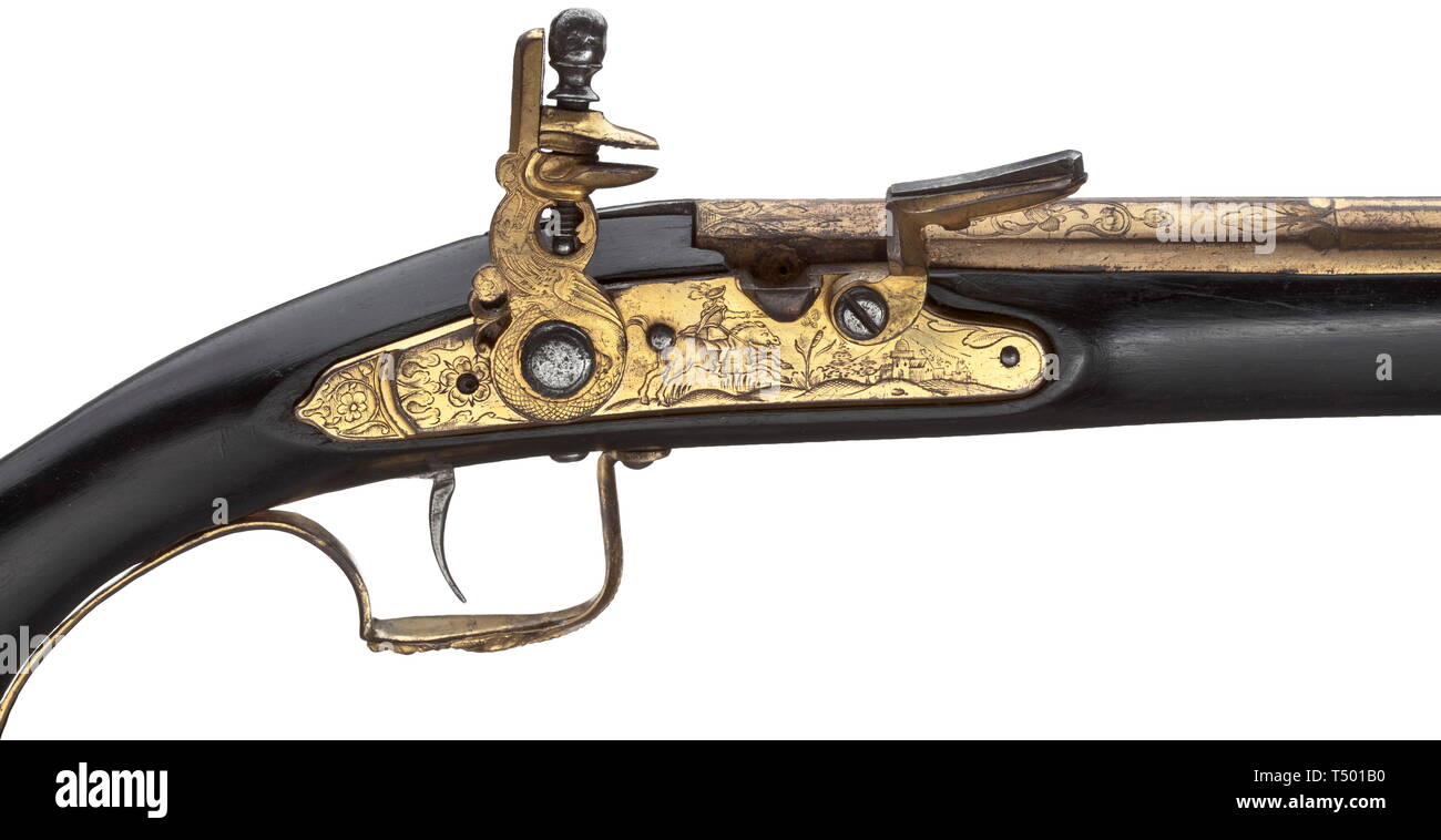 A splendid flintlock pistol, in the style of Felix Werder, Zurich, circa 1660. Fire-gilt bronze barrel with three-stage profile, octagonal then hexadecagonal then round. Slightly shortened barrel, the smooth bore in 13 mm calibre with a slightly sagged axle. At the breech fine hunting-themed engravings amid tendrils. Lined vent hole. The lock made from fire-gilt bronze with iron screws and mechanism. The lockplate with engraved depiction of a horseman in front of a city scene, the hammer decorated with mythical creatures. Gilt bronze furniture in, Additional-Rights-Clearance-Info-Not-Available Stock Photo