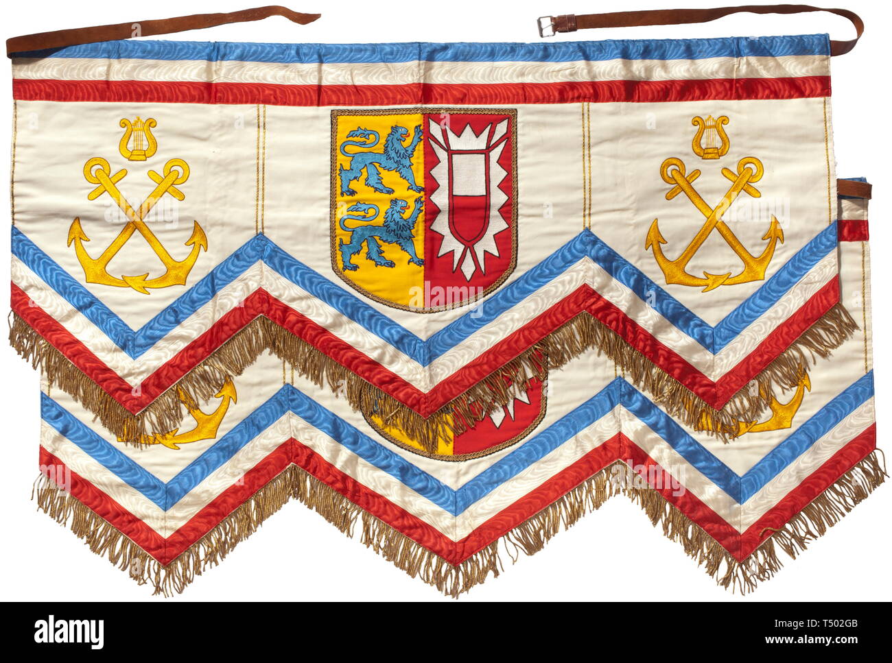 Two kettledrum hangings - line battleship Schleswig-Holstein. Fine cotton cloth rendered in multiple colours with trim in the state colours of Schleswig-Holstein and gold fringe, the fields with crossed anchors with lyres and the coat of arms of the state that gave its name to the ship, leather strapping. The reverse of each labelled with the flag factory tag of 'M. Fleck, Hamburg'. Cloth dimensions ca. 110 x 55 cm. Extremely rare kettledrum hangings. On 1 September 1939 the ship participated in the attack against the fortified Westerplatte position near Danzig. According t, Editorial-Use-Only Stock Photo