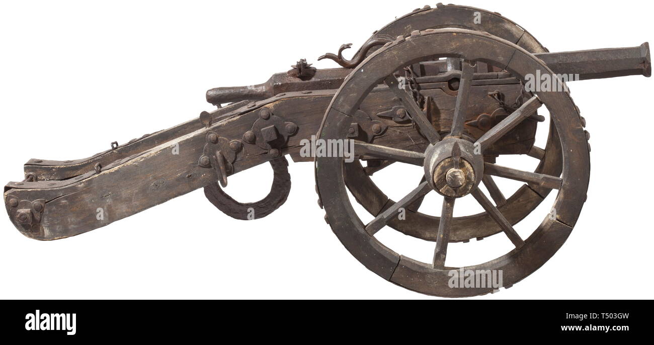 A German salute cannon 19th century. Wrought iron. Conical, octagonal barrel with cannon muzzle in 26 mm calibre. Attached handles with ring-shaped trunnions and hinged vent cover. Mounted on an oakwood carriage with iron fittings. Barrel length 66.5 cm, total length 97 cm. historic, historical, cannon, cannons, artillery, firearm, fire arm, firearms, fire arms, weapons, arms, weapon, arm, fighting device, military, militaria, object, objects, stills, clipping, clippings, cut out, cut-out, cut-outs, 19th century, Additional-Rights-Clearance-Info-Not-Available Stock Photo