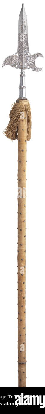 A French spontoon, 18th century. Blade richly etched with a portrait medallion, trophies and strapwork, with remains of gilding. Tapering socket segmented by balusters. Studded and velvet-covered haft with fringes of later date. Fabrics with slights signs of age and wear, the haft somewhat shortened. Length 173 cm. historic, historical, 18th century, Europe, 18th century, Additional-Rights-Clearance-Info-Not-Available Stock Photo