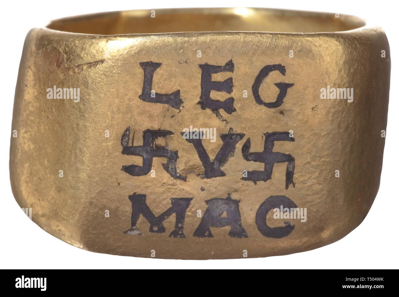 A Roman gold ring for an officer of the Legio V Macedonia, 2nd/3rd century AD. Yellow gold. Tapered shank with rectangular panel. Nielloed inscription 'LEG V MAC' between two swastikas on top. Width 1,9 cm, weight 9 g. The Legio V Macedonia was founded in the year 43 BC by Octavian, the later Augustus, and Consul Gaius Vibius Pansa Caetroniasus. It existed in Moesia until the 5th century. Provenance: South German private collection, 1970s and later. historic, historical, Roman Empire, ancient world, ancient times, ancient world, Additional-Rights-Clearance-Info-Not-Available Stock Photo