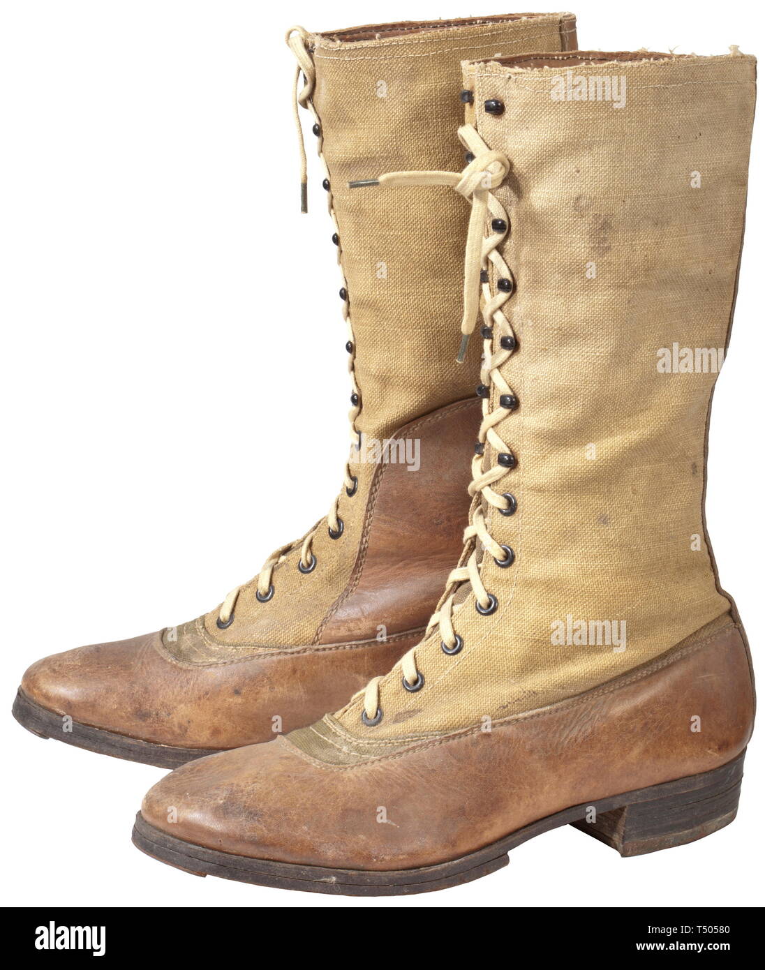A pair of DAK tropical boots. Made of canvas with brown leather