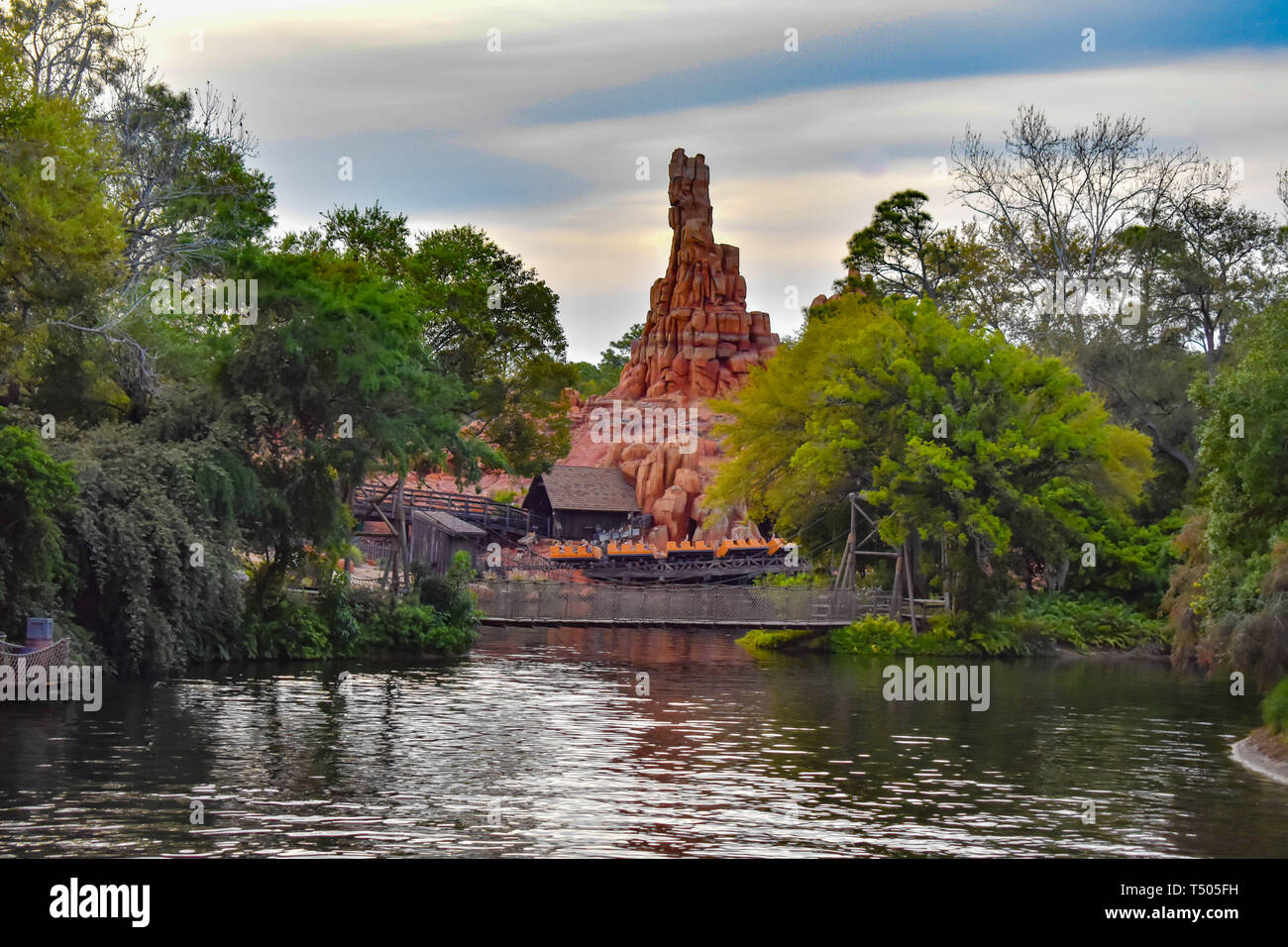 Orlando, Florida. March 19, 2019. Beautiful view of Thunder Mountain , forest and lake in Magic Kingdom at Walt Disney World . Stock Photo