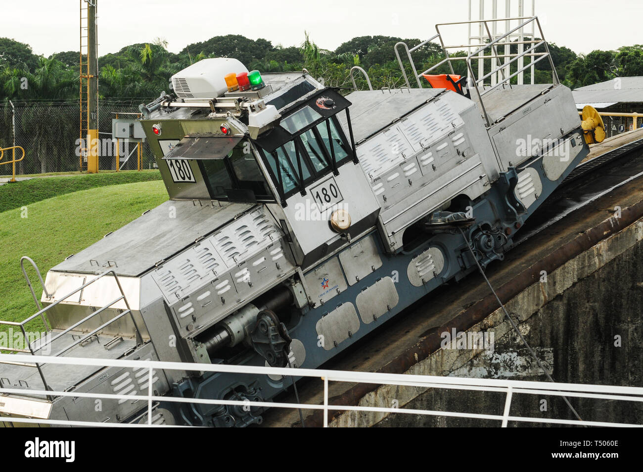 Mules towing cruise ships through the Panama Canal Stock Photo - Alamy