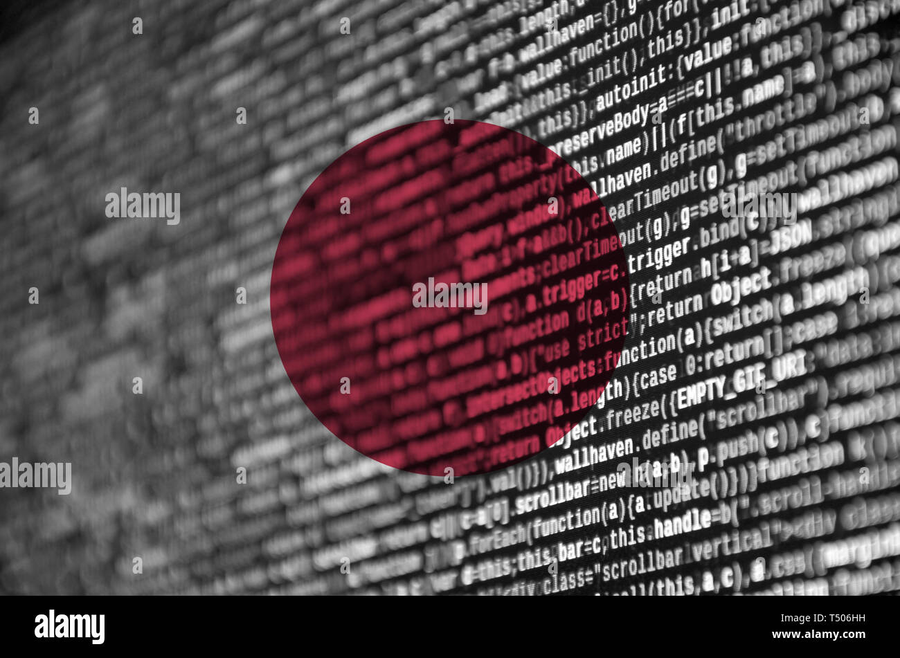 Japan flag is depicted on the screen with the program code. The concept ...