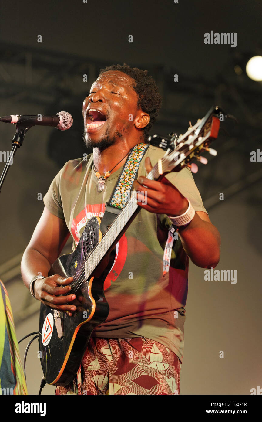 Namibian artist Elemotho G.R Mosimane performing at the Womad Festival, Charlton Park, UK. July 26, 2014. Stock Photo