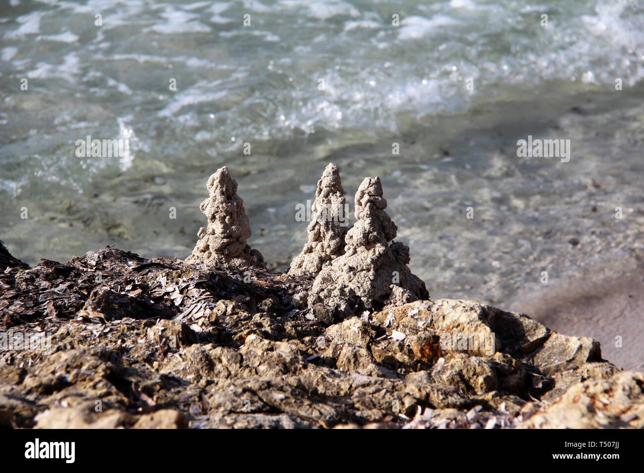 Pyramids made of beach sand Stock Photo Alamy