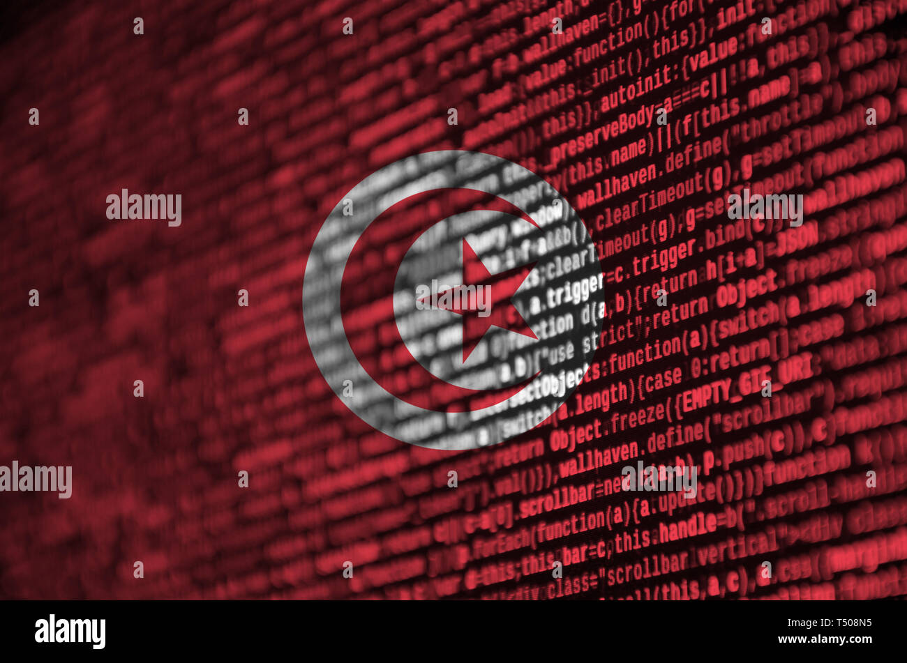 Tunisia flag  is depicted on the screen with the program code. The concept of modern technology and site development. Stock Photo