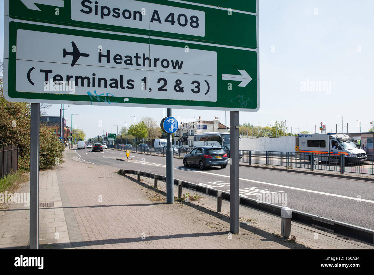 London, UK. 19th April, 2019. A police vehicle parked alongside the A4 outside Heathrow airport following a small protest earlier by Extinction Rebellion Youth. A large police presence is evident around the airport but so far any disruption feared by the airport authorities from Extinction Rebellion climate change activists has been symbolic rather than material. Credit: Mark Kerrison/Alamy Live News Stock Photo