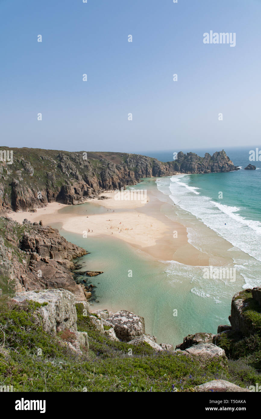 Treen, Cornwall, UK. 19th April 2019. UK Weather: The beaches at Treen and Porthcurno were looking like the carribean on Easter Friday. It was hot. and locals and holiday makers were making the most of the turquoise sea. Stock Photo
