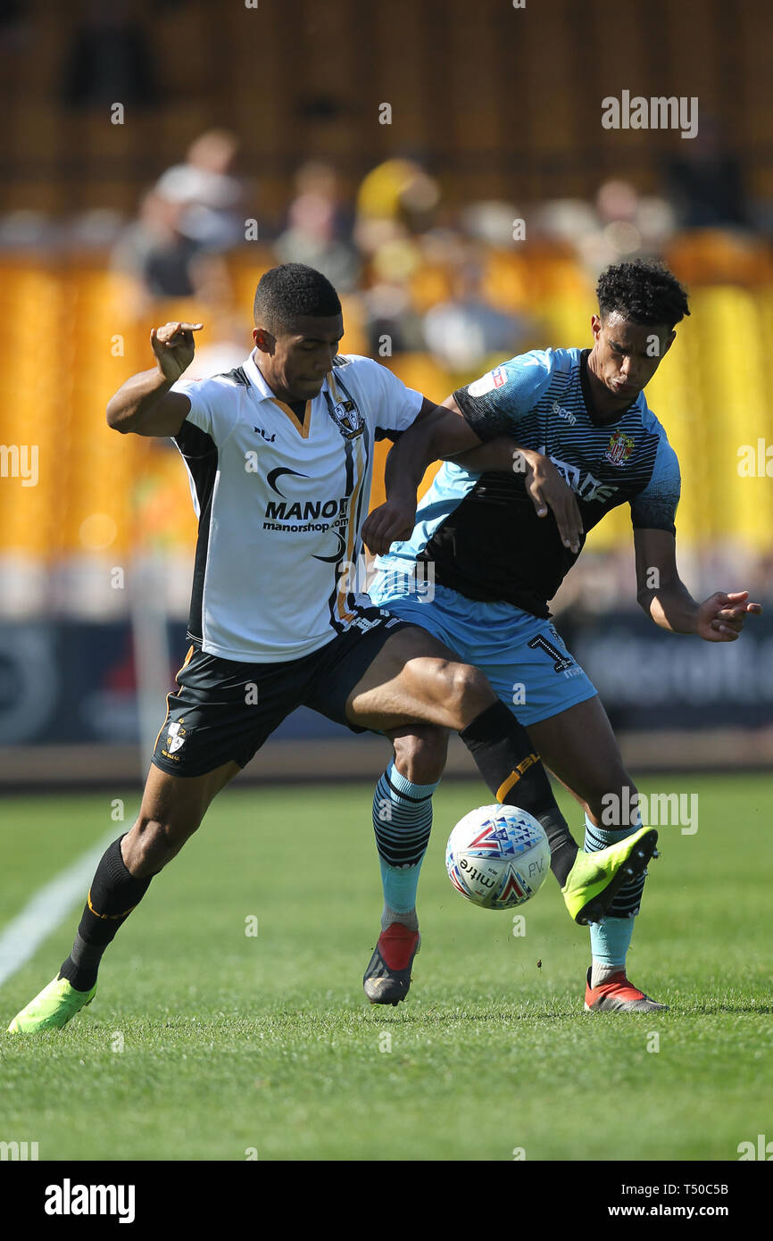 Burslem, Stoke-on-Trent, UK. 19th Apr, 2019. Port Vale forward Danny Elliott (17) fights for the ball with Stevenage defender Terence Vancooten (15) during the EFL Sky Bet League 2 match between Port Vale and Stevenage at Vale Park, Burslem, England on 19 April 2019. Photo by Jurek Biegus. Editorial use only, license required for commercial use. No use in betting, games or a single club/league/player publications. Credit: UK Sports Pics Ltd/Alamy Live News Stock Photo
