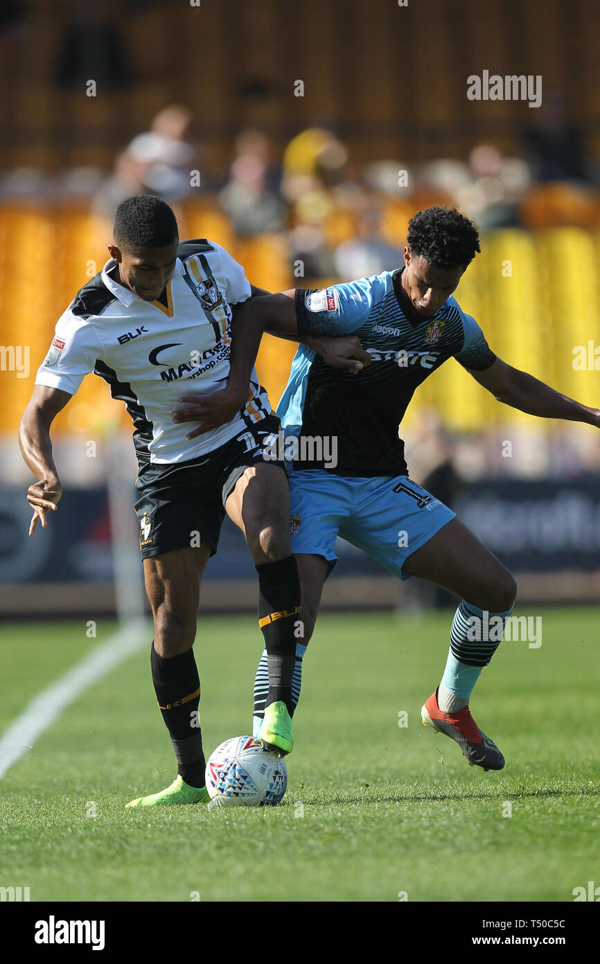 Burslem, Stoke-on-Trent, UK. 19th Apr, 2019. Port Vale forward Danny Elliott (17) fights for the ball with Stevenage defender Terence Vancooten (15) during the EFL Sky Bet League 2 match between Port Vale and Stevenage at Vale Park, Burslem, England on 19 April 2019. Photo by Jurek Biegus. Editorial use only, license required for commercial use. No use in betting, games or a single club/league/player publications. Credit: UK Sports Pics Ltd/Alamy Live News Stock Photo