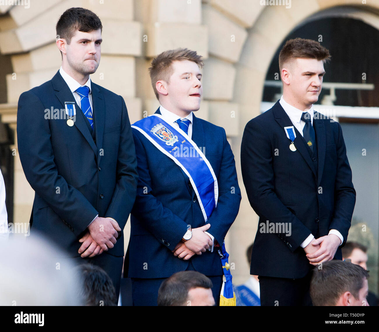 Kelso, Scottish Borders, UK. April 19 2019. The residents of Kelso gather in the town square to watch the announcement of Mark Henderson being named as the 2019 Kelso Laddie in Kelso Square on April 19 2019 in Kelso, UK. Credit: Scottish Borders Media/Alamy Live News Stock Photo