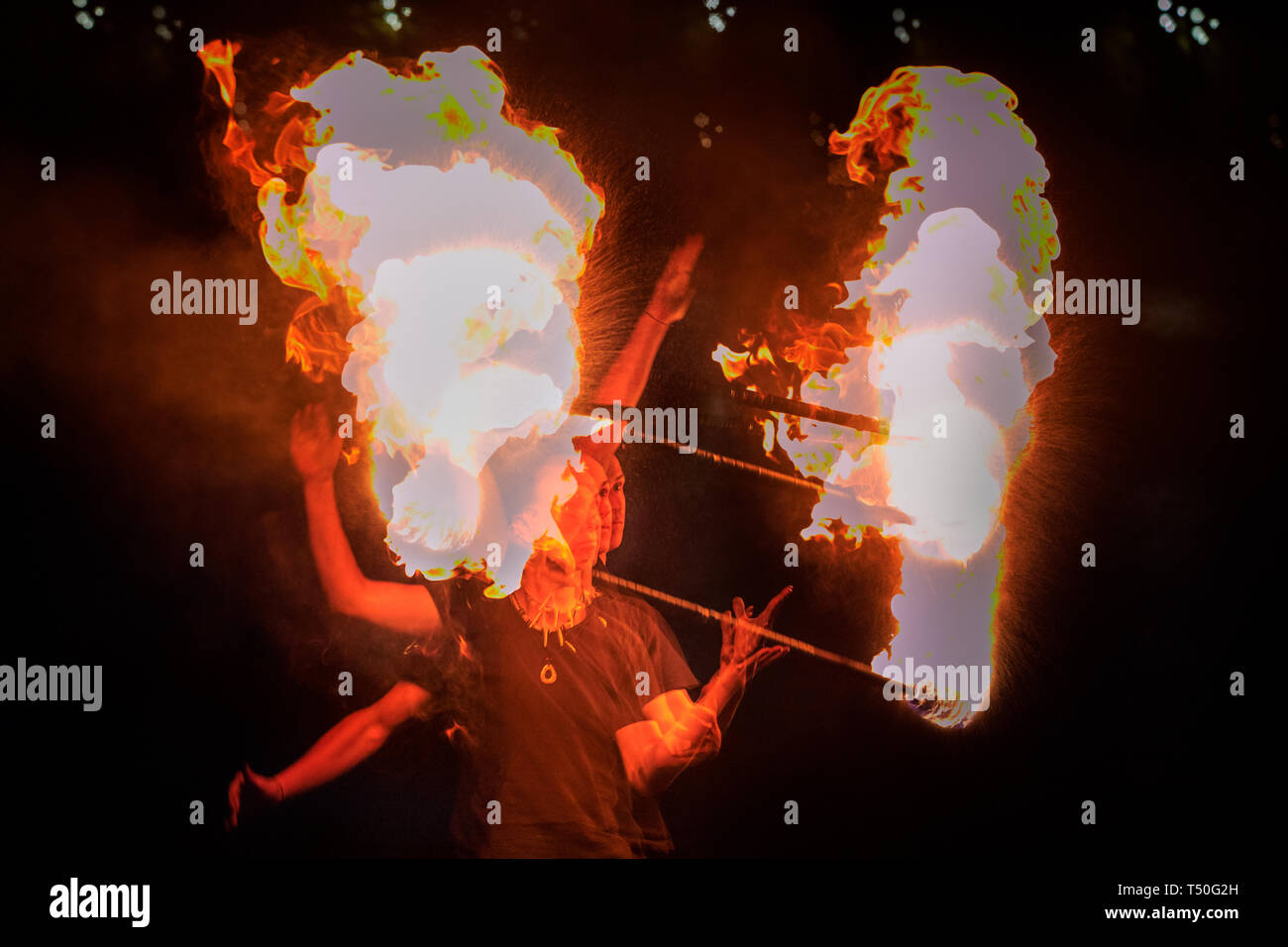 London, UK. 19th Apr, 2019. A member of the 'London Fire Spinners