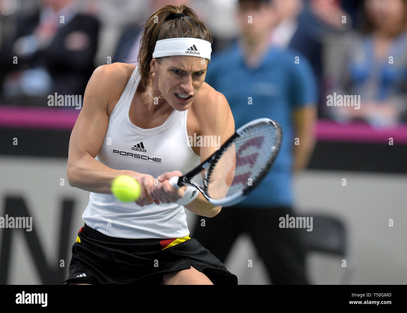 Riga. 19th Apr, 2019. Andrea Petkovic of Germany returns a shot to Jelena Ostapenko of Latvia during the 2019 Fed Cup World Group Play-offs between Latvia and Germany in Riga, Latvia on April 19, 2019. Credit: Edijs Palens/Xinhua/Alamy Live News Stock Photo