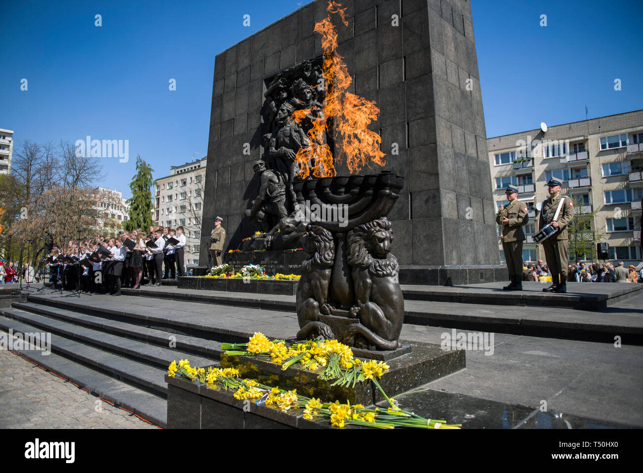 A view of The monument to Warsaw Heroes of the Ghetto during a ceremony to mark the 76th anniversary of the outbreak of the Warsaw Ghetto Uprising. As part of the ceremony alarm sirens were heard throughout the city to remember those who were murdered in the ghetto in 1943. The Warsaw ghetto uprising was a violent revolt that occurred from April 19 to May 16, 1943, during World War II. Residents of the Jewish ghetto in Nazi-occupied Warsaw, Poland, staged the armed revolt to prevent deportations to Nazi-run extermination camps. Stock Photo