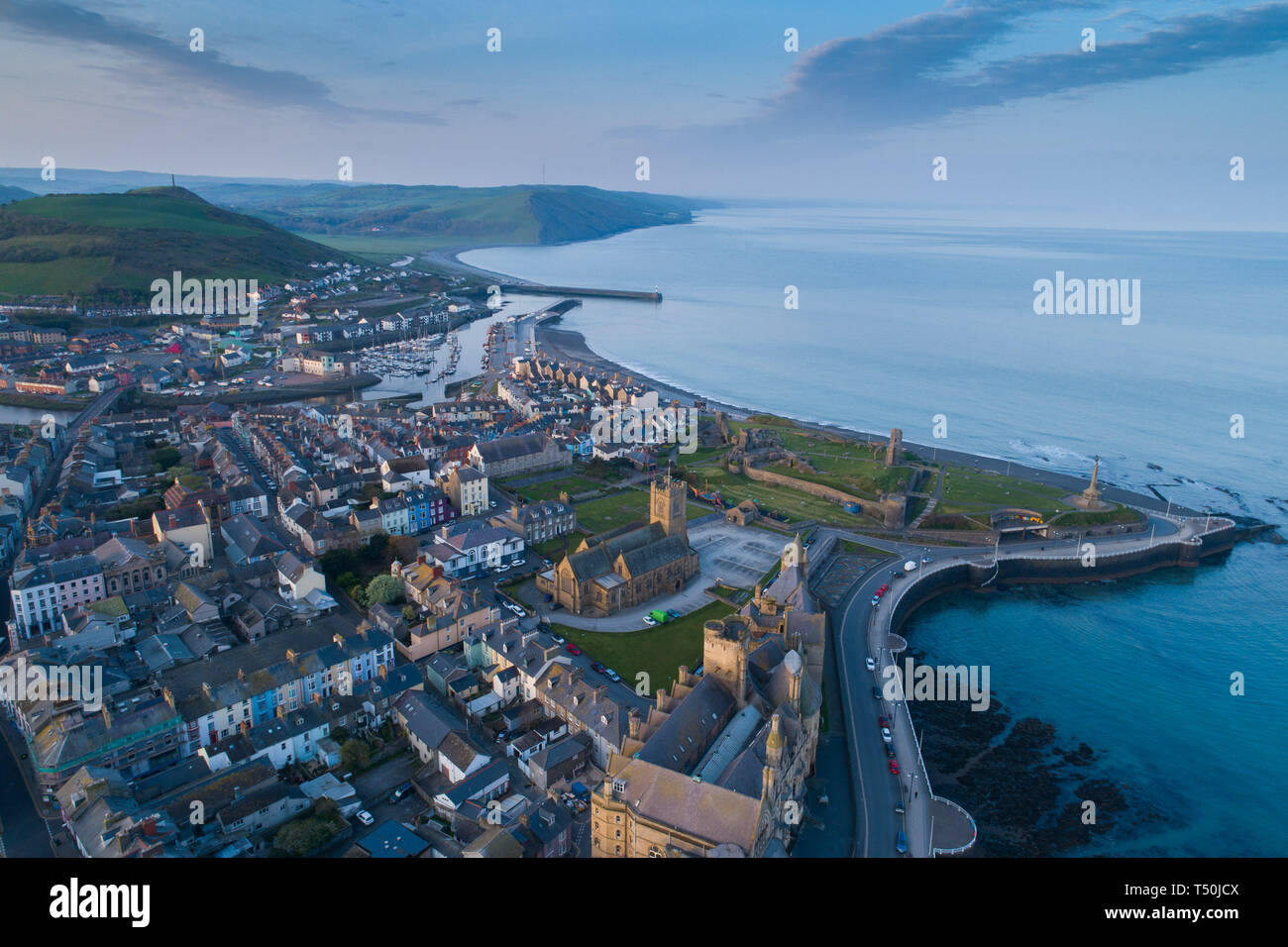 Aberystwyth Wales UK, Easter Saturday, 20 April 2019. UK Weather: Daybreak over the seaside and university town of Aberystwyth on the west wales coast, at the start of Easter Saturday 2019. The weather is again set to be hot and sunny, with temperatures in the low 20's Celsius (low 70's Fahrenheit). Credit: keith morris/Alamy Live News Stock Photo