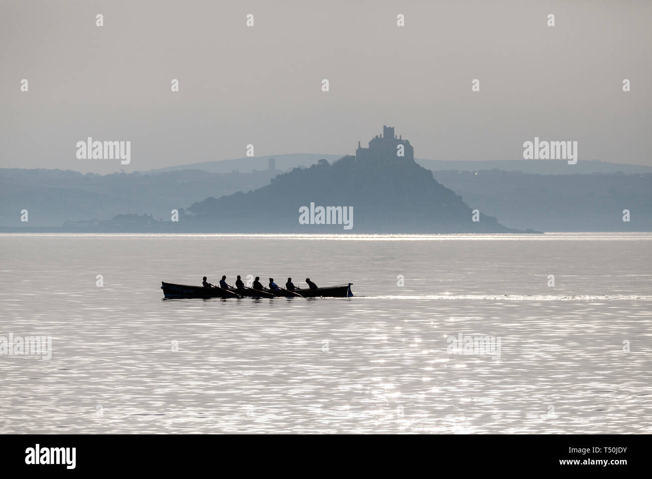 Penzance, Cornwall. 20th April 2019. UK Weather: A hazy morning in front of St Michael's Mount is the forerunner to another hot Easter day.  Credit: Mike Newman/Alamy Live News. Stock Photo