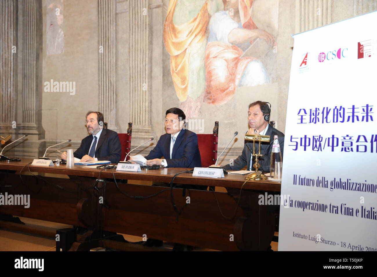 Rome, Rome. 18th Apr, 2019. Xie Fuzhan (C), president of the Chinese Academy of Social Sciences (CASS), delivers a speech at a seminar in Rome, Italy on April 18, 2019. A seminar was held here Thursday, where Chinese and Italian scholars gathered to discuss Sino-Italian and Sino-European relations as well as globalization. Credit: Cheng Tingting/Xinhua/Alamy Live News Stock Photo