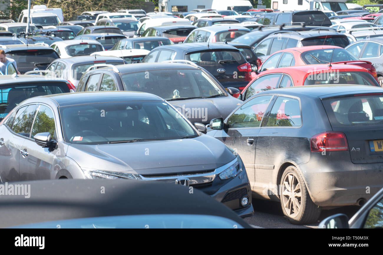 Lyme Regis, Dorset, UK. 20th April 2019. UK Weather: Visitors flock to the seaside resort of Lyme Regis to enjo the sizzling hot Easter Saturday sunshine on the hottest day of the year so far. The popular tourist town's car parks were rammed full by 10.30 am. Credit: Celia McMahon/Alamy Live News. Stock Photo