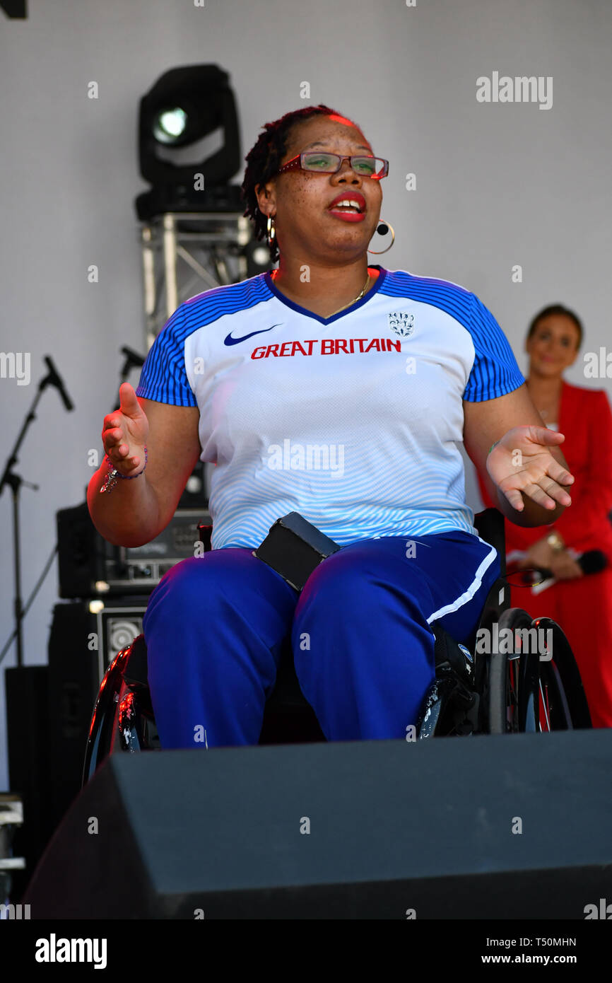 London, UK. 20th April, 2019.Speaker Vanessa Wallace is a British Athletics the Feast of St George to celebrate English culture with music and English food stalls in Trafalgar Square on 20 April 2019, London, UK. Credit: Picture Capital/Alamy Live News Stock Photo