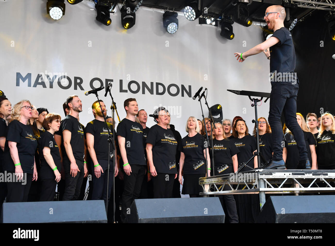 London, UK. 20th April, 2019.Westend Music Choir perfroms at the Feast of St George to celebrate English culture with music and English food stalls in Trafalgar Square on 20 April 2019, London, UK. Credit: Picture Capital/Alamy Live News Stock Photo