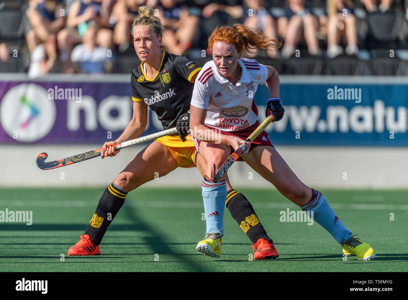Amsterdam, Netherlands. 19th Apr, 2019. AMSTERDAM, 19-04-2019, Euro Hockey Club Cup 2019. Venue: Wagener Stadion. Lieke Hulsen and Kate Crotty during the game HC Den Bosch vs Loreto HC. Credit: Pro Shots/Alamy Live News Stock Photo