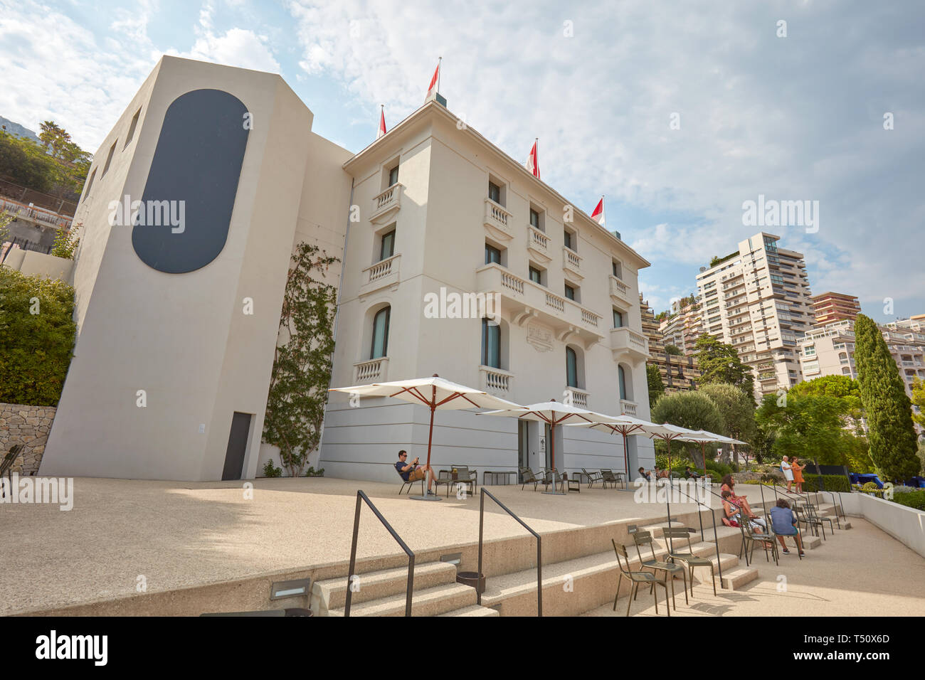 MONTE CARLO, MONACO - AUGUST 20, 2016: Villa Paloma contemporary art museum building with people in a sunny summer day in Monte Carlo, Monaco. Stock Photo