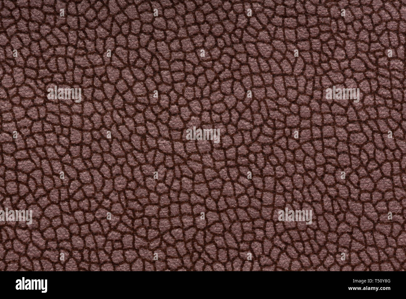 Simple relief brown fabric texture .Can be used as background. Stock Photo