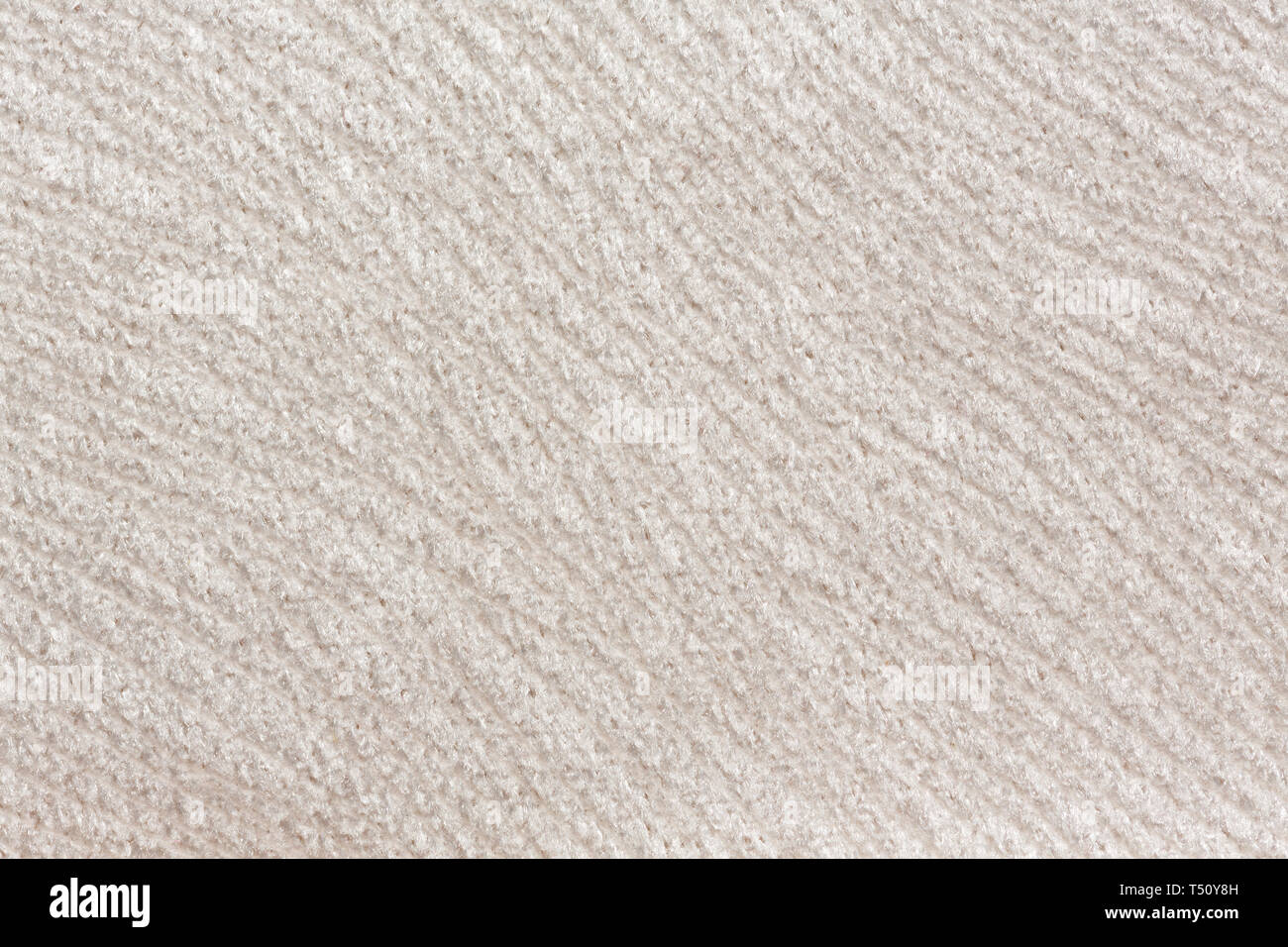 Elegant white fabric texture with relief surface. Stock Photo