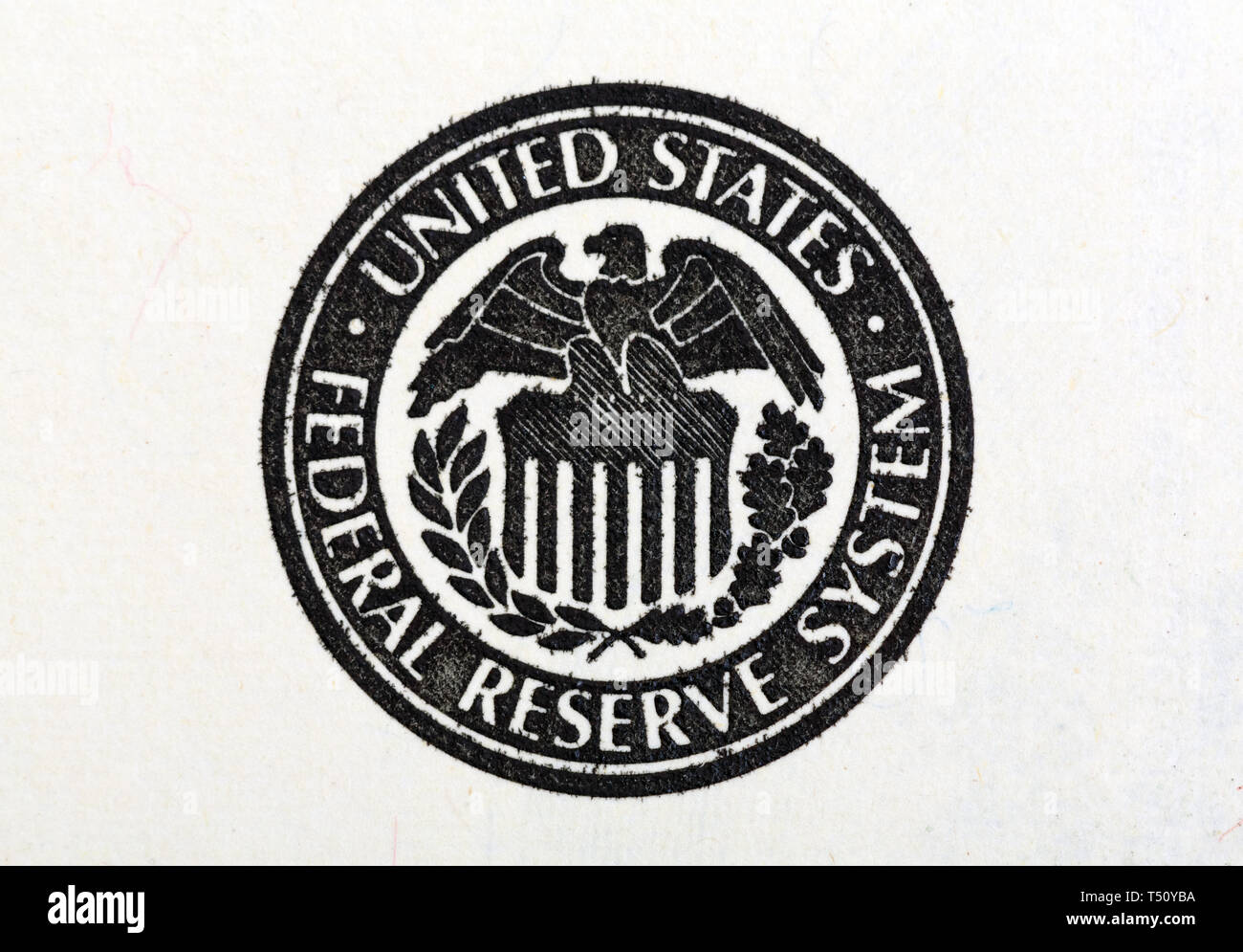 Macro shot of United States Federal Reserve System symbol on old 100 dollar bill. Stock Photo