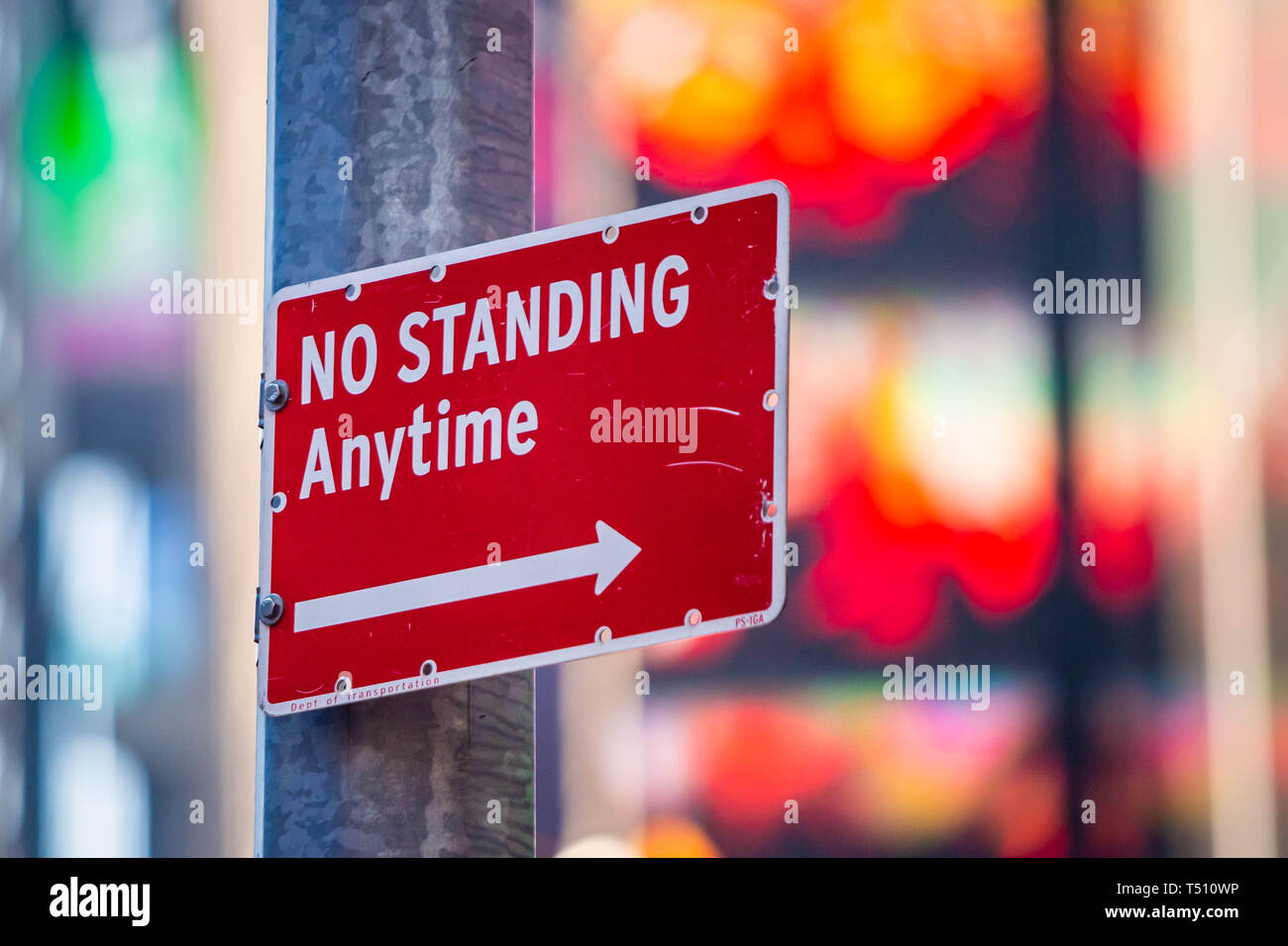 No Standing Anytime street sign in city at day Stock Photo