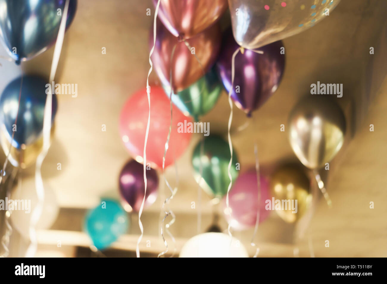 Blurred Background With Multicolored Balloons Under The