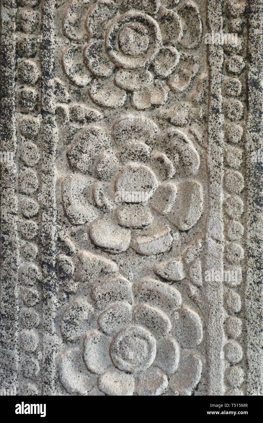 Angkor Pattern Grey (gray) circular patterns (medallions) engraved in sandstone on a ...