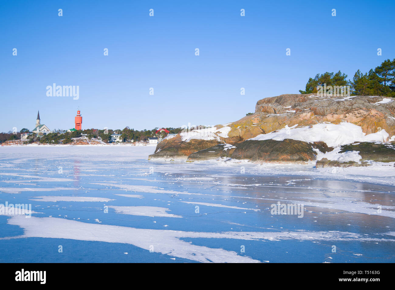 Sunny winter day on the ice of the Finnish Bay. Hanko Peninsula, Finland Stock Photo