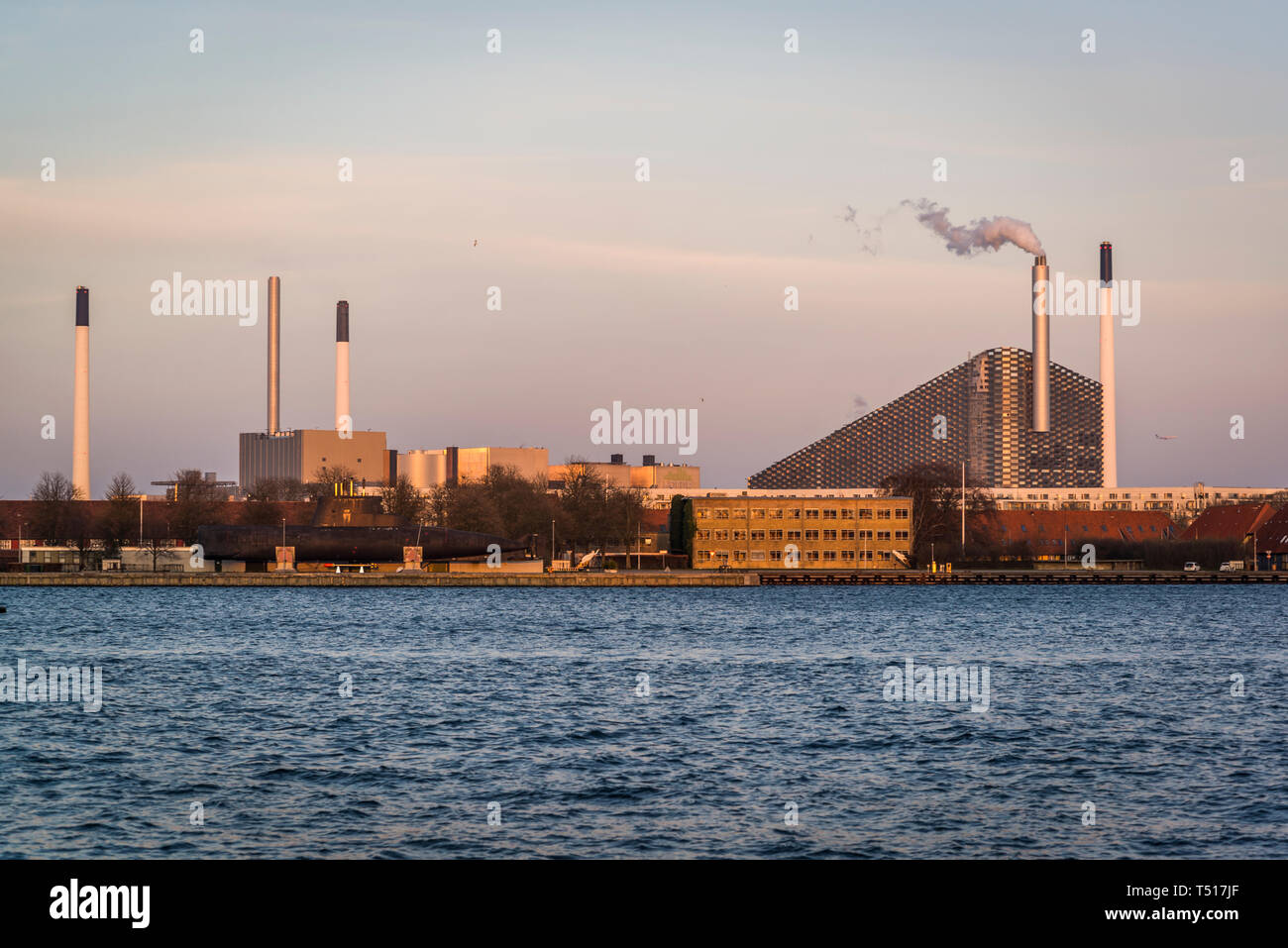 View of Amager Bakke or Amager Hill also known as Amager Slope or Copenhill, a combined heat and power waste-to-energy plant in Amager, Copenhagen, De Stock Photo