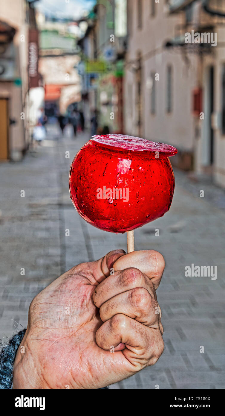 Candy Apple on a Stick Stock Photo