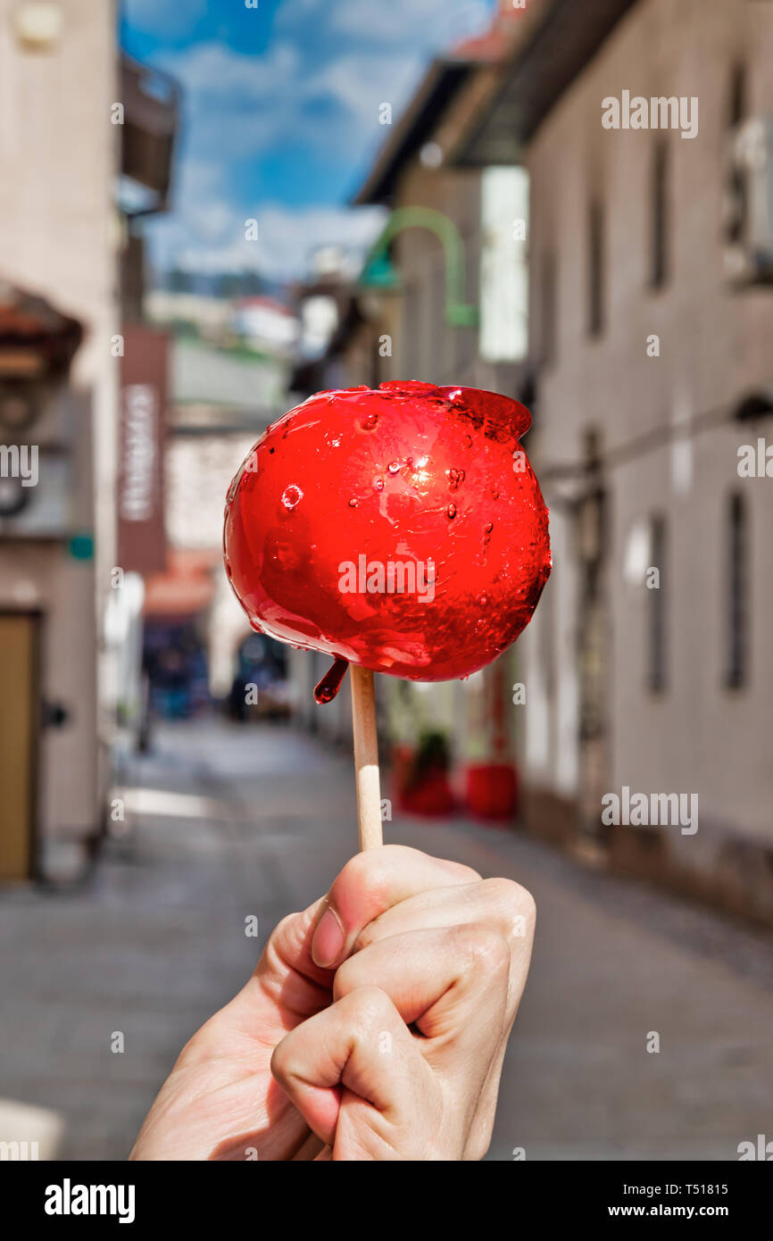 Candy Apple on a Stick Stock Photo - Alamy